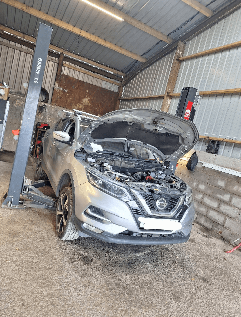 Mechanic working on a car